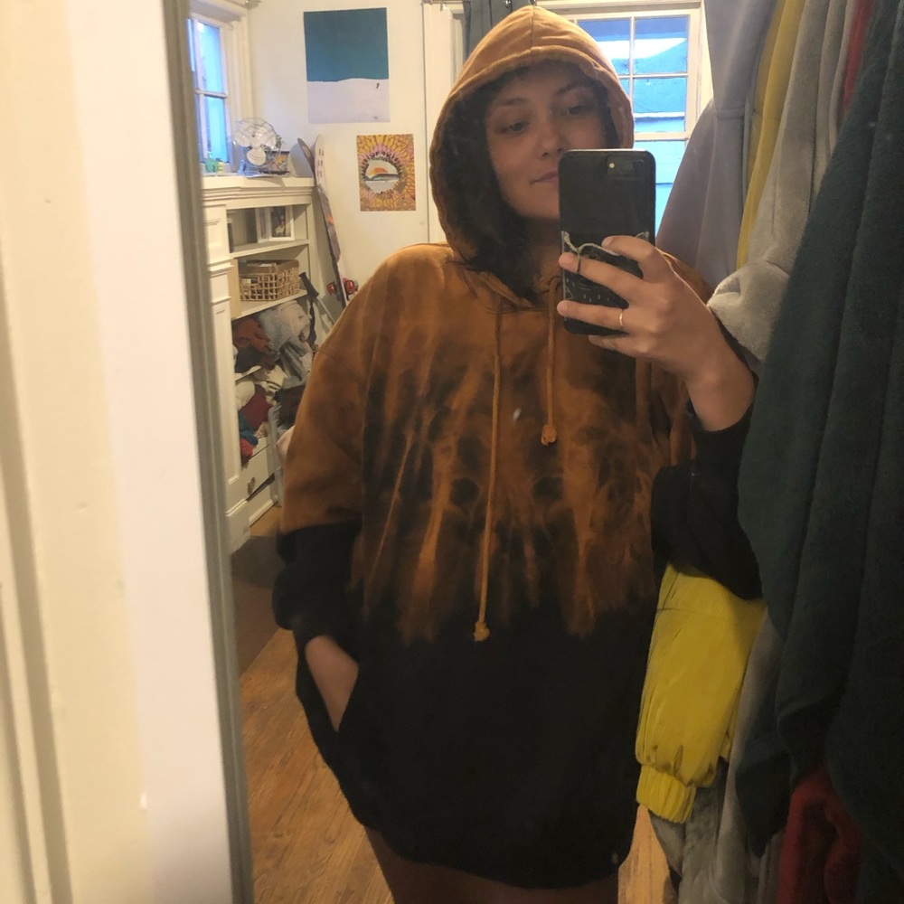 Acid wash on a black brandy Melville sweatshirt